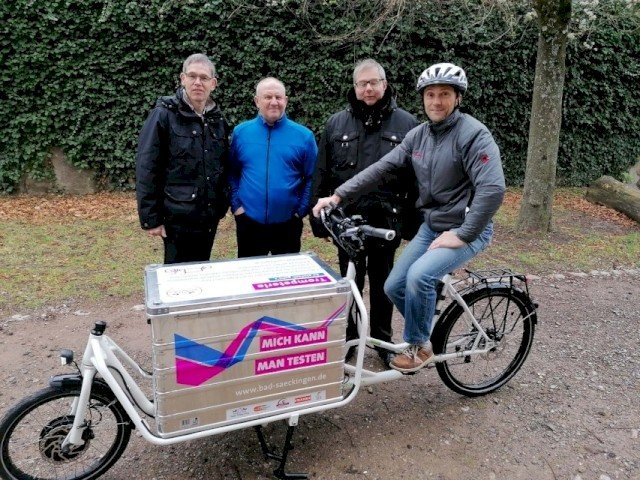 Cargo bike with box is used to transport goods within a company